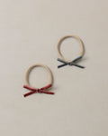 baby bow headbands in green & ruby