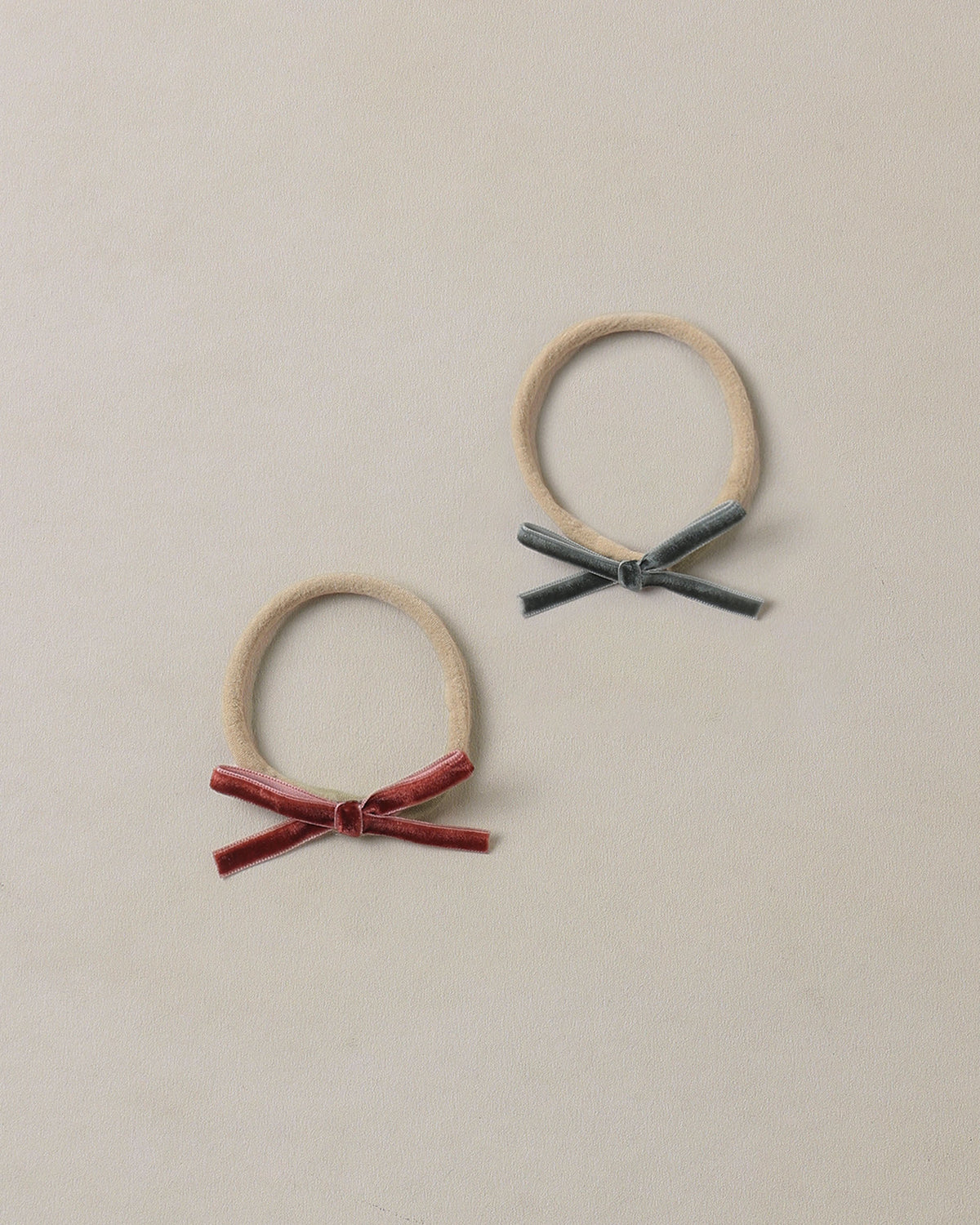 baby bow headbands in green & ruby